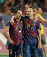 Fussball UEFA SUPER CUP 2011: Xavi Hernandez (Barca)  und Andres Iniesta (Barca)