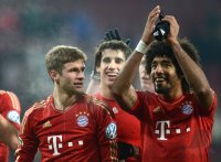 FUSSBALL DFB POKAL  Saison 2012/2013:  Jubel nach dem Sieg, Thomas Mueller, Javi , Javier Martinez und Dante (v.li. FC Bayern Muenchen)