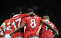 Fussball CHL  Saison 2010/2011: JUBEL Nani, Anderson, Paul Scholes (v. li., Manchester United FC)