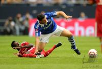 FUSSBALL: LIGA TOTAL CUP 2010 , Jonathan Pitroipa (li, HSV)  gegen Kyriakos Papadopoulos (re, Schalke)
