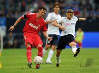 FUSSBALL: LIGA TOTAL CUP 2010 , Milivoje Novakovic (li, Koeln) gegen Anatoliy Tymoshchuk , Anatoli Timoschtschuk (re, FCB)