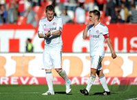 Fussball 1. Bundesliga : Bastian Schweinsteiger, Philipp Lahm (v. li., FC Bayern Muenchen)