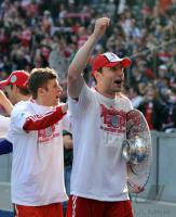 Fussball 1. Bundesliga: Mark van Bommel, Thomas Mueller (v. re., FCB)