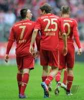 Fussball 1. Bundesliga, Saison 2011/2012: Franck Ribery (li.) mit Thomas Mueller (FC Bayern Muenchen)
