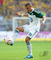 Fussball: 1. Bundesliga Saison 2010/2011: Wolfsburg, JOHNSON Einzelaktion