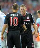 Fussball CHL  Saison 2011/2012:  Arjen Robben, Bastian Schweinsteiger (v. li., FC Bayern Muenchen)