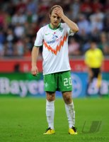 Fussball: 1. Bundesliga Saison 2010/2011: Bremen, JENSEN Einzelaktion