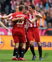 Fussball 1. Bundesliga: Thomas Mueller, Mark van Bommel (v.li, FCB)