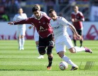 Fussball 1. Bundesliga : Mehmet Ekici (li, 1 FC Nuernberg) gegen Franck Ribery (re, FC Bayern Muenchen)