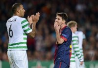 FUSSBALL INTERNATIONAL CHL 12/13:  Kelvin Wilson (li, Celtic) gegen Lionel Messi (Barca)