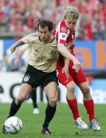 Fussball 1. Bundesliga: FSV Mainz 05 - Bayern Muenchen, Zweikampf