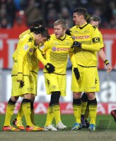 Fussball 1. Bundesliga, Saison 2011/2012: JUBEL nach dem Tor zum 0:1 Moritz Leitner , Jakub  KUBA Blaszczykowski , Sebastian Kehl (v. li., Borussia Dortmund)