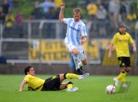 1. Fussball Bundesliga: Dimitar Rangelov  (li, BVB) gegen Stefan Aigner  (re, 1860 Muenchen)