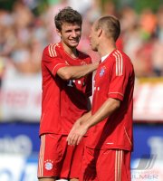 Fussball 1. Bundesliga Saison   2011/2012 :  Thomas Mueller , Arjen Robben (v. li., FC Bayern Muenchen)