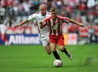 Fussball 1. Bundesliga : Miroslav Karhan (li, 1. FSV Mainz 05) gegen Toni Kroos (re, FC Bayern Muenchen)