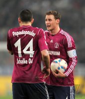 Fussball DFB Pokal 11/12 :  Kyriakos Papadopoulos, Benedikt Hoewedes (v. li., FC Schalke 04)
