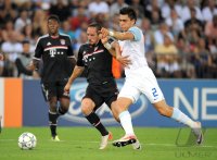 Fussball CHL  Saison 2011/2012:  Franck Ribery (li, FC Bayern Muenchen) gegen Jorge Teixeira (re, FC Zuerich)
