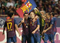 Fussball UEFA SUPER CUP 2011: Xavi Hernandez (Barca)  und Andres Iniesta (Barca)