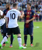 FUSSBALL International: Lionel Messi (Barca) und Wayne Rooney (Manchester United FC)