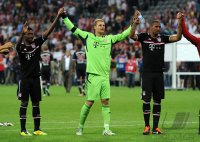 Fussball International Audi Cup 2011: Thomas Mueller, Torwart Manuel Neuer, Jerome Boateng (v. li., FC Bayern Muenchen)