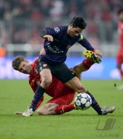 FUSSBALL INTERNATIONAL CHL ACHTELFINALE 12/13: FC Bayern Muenchen - FC Arsenal London