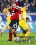 Fussball 1. Bundesliga: Leverkusen - Rostock, Zweikampf