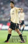 Fussball 1. Bundesliga: Bayern, HASHEMIAN zeigend