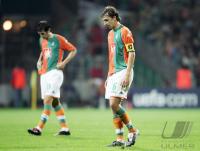 Fussball Champions League: Bremen - Barcelona, BAUMANN, MICOUD enttaeuscht