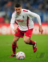 Fussball: 1. Bundesliga Saison 2010/2011: SC Freiburg, CALIGUIRI am Ball