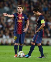 FUSSBALL INTERNATIONAL CHL 12/13: Lionel Messi und Xavi Hernandez (v. li., Barca)