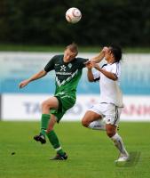 1. Fussball Bundesliga: Felix Kroos (li, SV Werder Bremen) gegen Luka Predrag li, Belgrad)