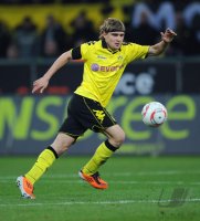 Fussball: 1. Bundesliga Saison 2010/2011: Dortmund, SCHMELZER am Ball