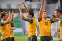 Fussball AFC Asian Cup 2011:  Luke Wilkshire, Tim Cahill, Harry Kewell (v. li., Australien)