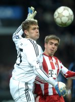 Fussball CHL  Saison 2010/2011: Thomas Kraft mit Philipp Lahm (v.li. FC Bayern Muenchen)