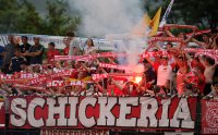 Fussball 1. Bundesliga Saison   2011/2012 :  SCHICKERIA Fans mit Bengalischen Feuer