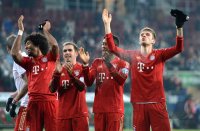 FUSSBALL DFB POKAL  Saison 2012/2013:  Dante , Philipp Lahm, David Alaba, Thomas Mueller (v.li., FC Bayern Muenchen)
