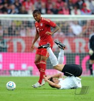 Fussball 1. Bundesliga : Luiz Gustavo (li, FC Bayern Muenchen) gegen Petar Sliskovic (re, 1. FSV Mainz 05)