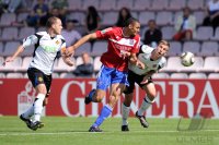 Fussball 3. Bundesliga : Dennis Brinkmann (li, TuS Koblenz) gegen Marc Nygaard  (mi, Unterhaching) gegen Ole Kittner (re, TuS Koblenz)