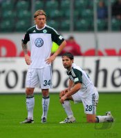 Fussball: 1. Bundesliga Saison 2010/2011: Wolfsburg, KJAER und DIEGO
