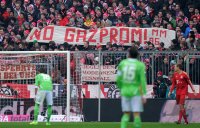 Fussball 1. Bundesliga, Saison 2011/2012: FCB Fans mit einem Banner NO GAZPROM