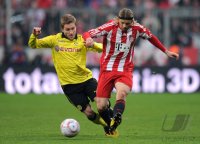 Fussball 1. Bundesliga : Jakub  KUBA Blaszczykowski (li, Borussia Dortmund) gegen Anatoliy Tymoshchuk  (re, FC Bayern Muenchen)