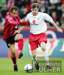 Fussball 1. Bundesliga: Leverkusen - Freiburg, Zweikampf