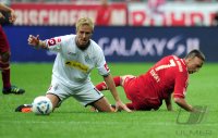 Fussball 1. Bundesliga, Saison 2011/2012:  Mike Hanke (li, Borussia Moenchengladbach)  gegen Franck Ribery (re, FC Bayern Muenchen)