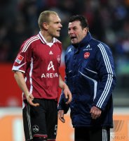 Fussball 1. Bundesliga :  Andreas Wolf  mit Trainer Dieter Hecking (v.li., 1 FC Nuernberg)