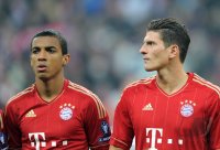 Fussball CHL  Saison 2011/2012:  Luiz Gustavo, Mario Gomez (v. li., FC Bayern Muenchen)