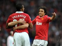 Fussball CHL  Saison 2010/2011:  Jubel mit Antonio Valencia , Rafael   (v. li., Manchester United FC)