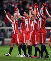 Fussball 1. Bundesliga : (v. li.) Bayern JUBEL mit Philipp Lahm, Mark van Bommel, Franck Ribery