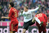 Fussball 1. Bundesliga, Saison 2011/2012:  (v. li.) Mario Gomez, Torwart Manuel Neuer, Holger Badstuber (FC Bayern Muenchen)