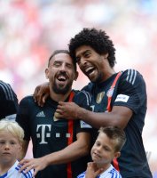 Fussball 1. Bundesliga 2014/2015: Franck Ribery (FC Bayern Muenchen) und Dante (FC Bayern Muenchen)