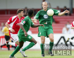 Fussball DFB-Pokal: Koeln (Am) - Wolfsburg, Zweikampf Hristov